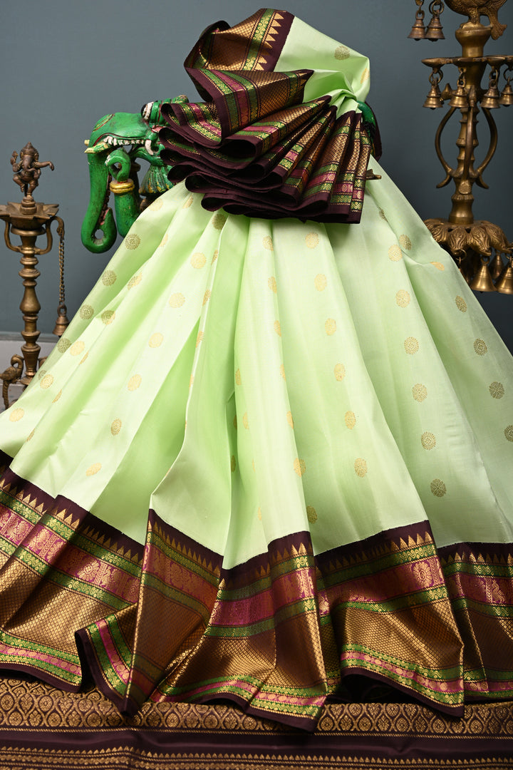 Korvai Tea Green Pure Gadwal Silk Saree with Zari Buttas and Contrast Wide Zari Border | SILK MARK CERTIFIED | SHOBITAM
