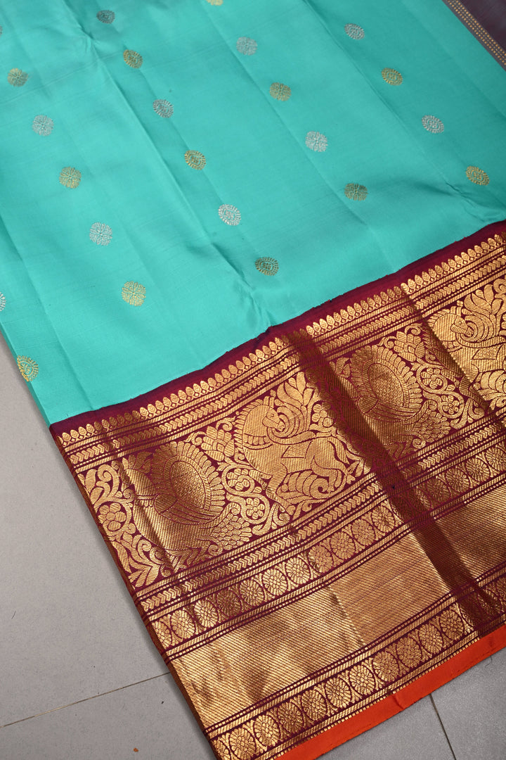 Korvai Turquoise Pure Gadwal Silk Saree with Gold-Silver Buttas and Contrast Wide Zari Border | SILK MARK CERTIFIED | SHOBITAM