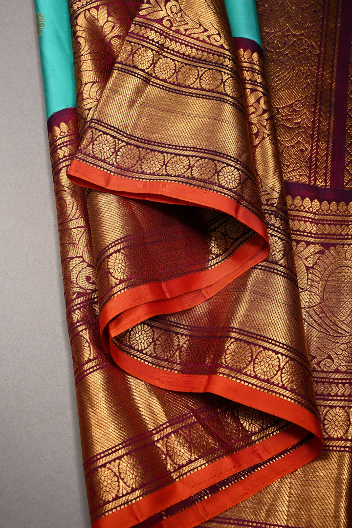 Korvai Turquoise Pure Gadwal Silk Saree with Gold-Silver Buttas and Contrast Wide Zari Border | SILK MARK CERTIFIED | SHOBITAM