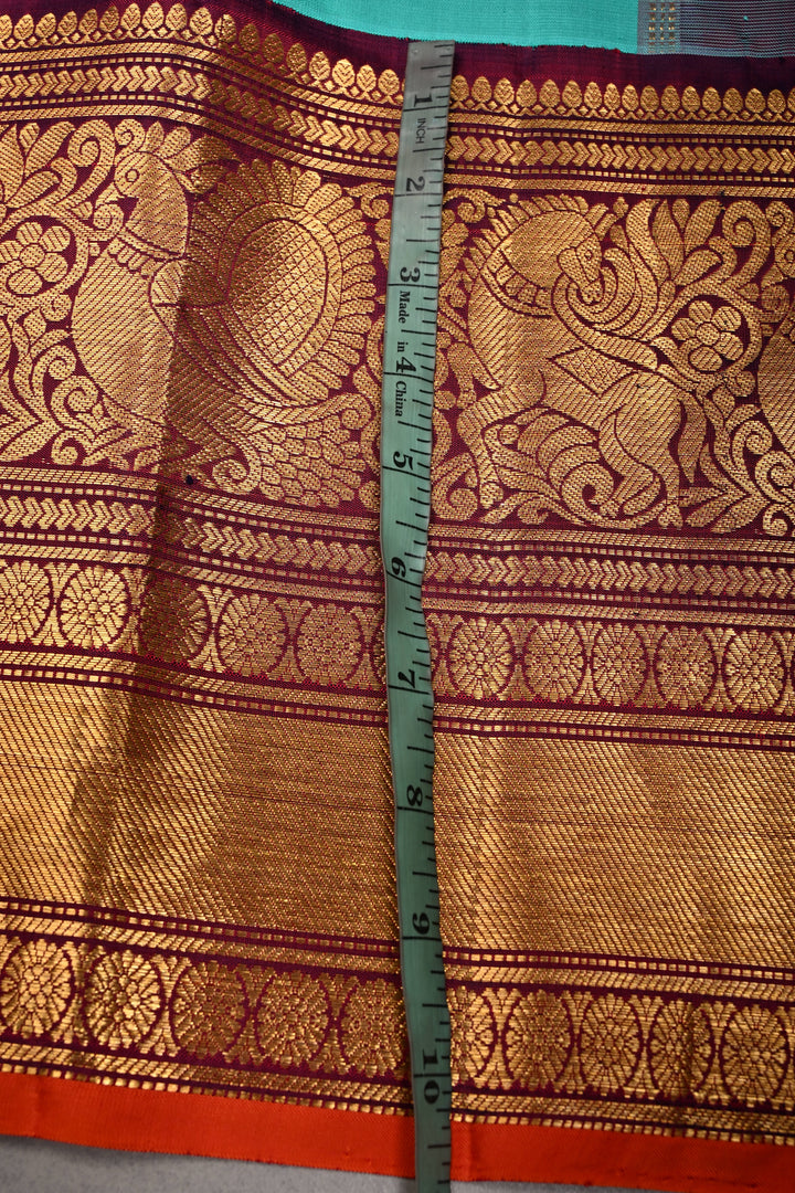 Korvai Turquoise Pure Gadwal Silk Saree with Gold-Silver Buttas and Contrast Wide Zari Border | SILK MARK CERTIFIED | SHOBITAM
