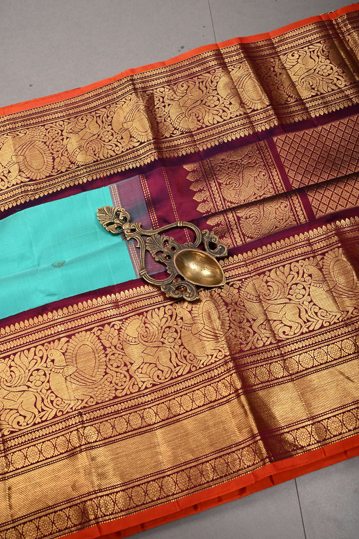Korvai Turquoise Pure Gadwal Silk Saree with Gold-Silver Buttas and Contrast Wide Zari Border | SILK MARK CERTIFIED | SHOBITAM