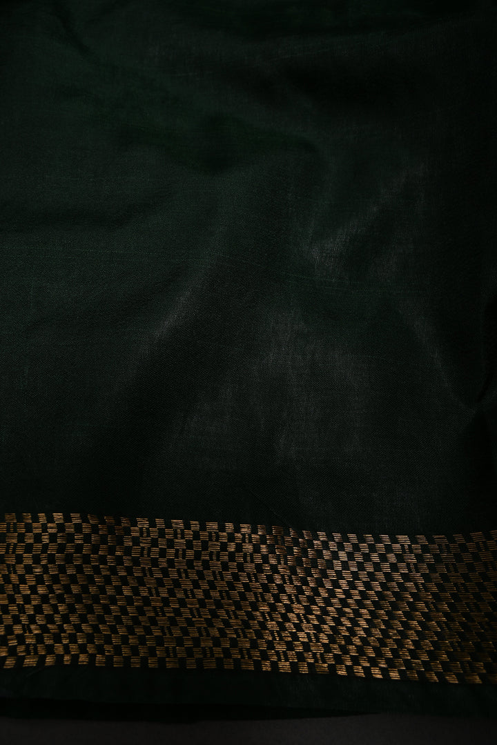 Dark Green Semi Tussar Saree with Geometric Zari Buttas and Zari Border | SHOBITAM