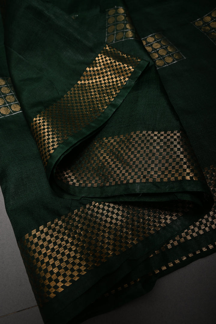 Dark Green Semi Tussar Saree with Geometric Zari Buttas and Zari Border | SHOBITAM