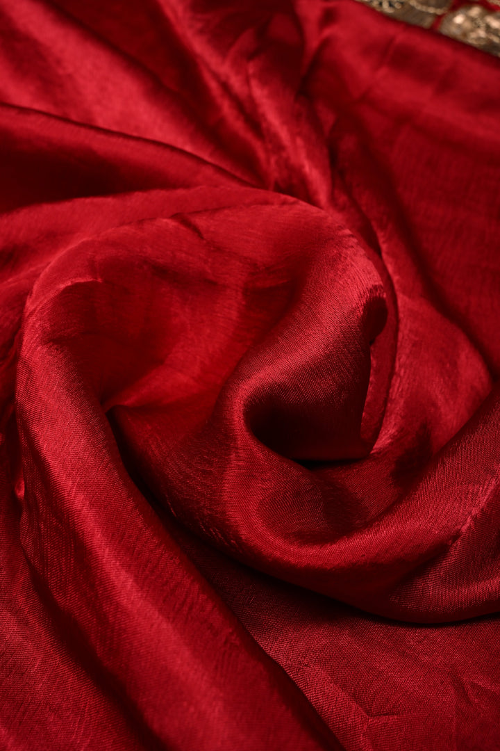 Red Satin Georgette Saree with Antique Matte Finish Cutdana, Sequins and Moti Embellishment and Scallop Border | SHOBITAM