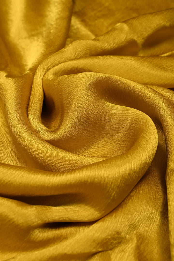 Moss Yellow Satin Georgette Saree with Antique Matte Finish Cutdana, Sequins and Moti Embellishment and Scallop Border | SHOBITAM