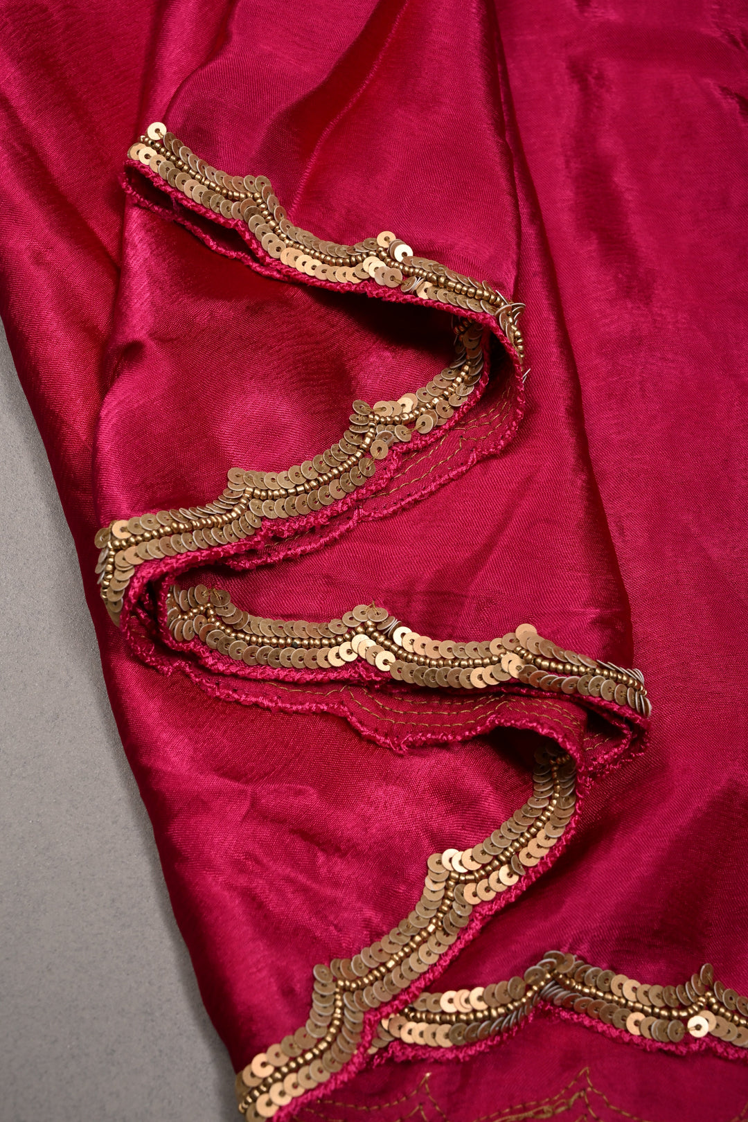 Hot Pink Satin Georgette Saree with Antique Matte Finish Cutdana, Sequins and Moti Embellishment and Scallop Border | SHOBITAM