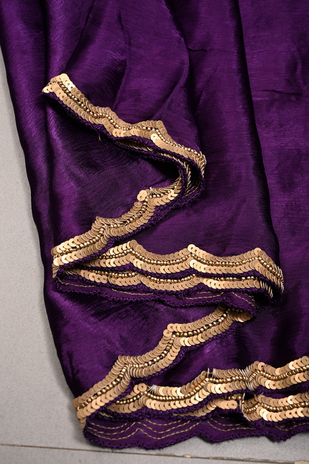 Purple Satin Georgette Saree with Antique Matte Finish Cutdana, Sequins and Moti Embellishment and Scallop Border