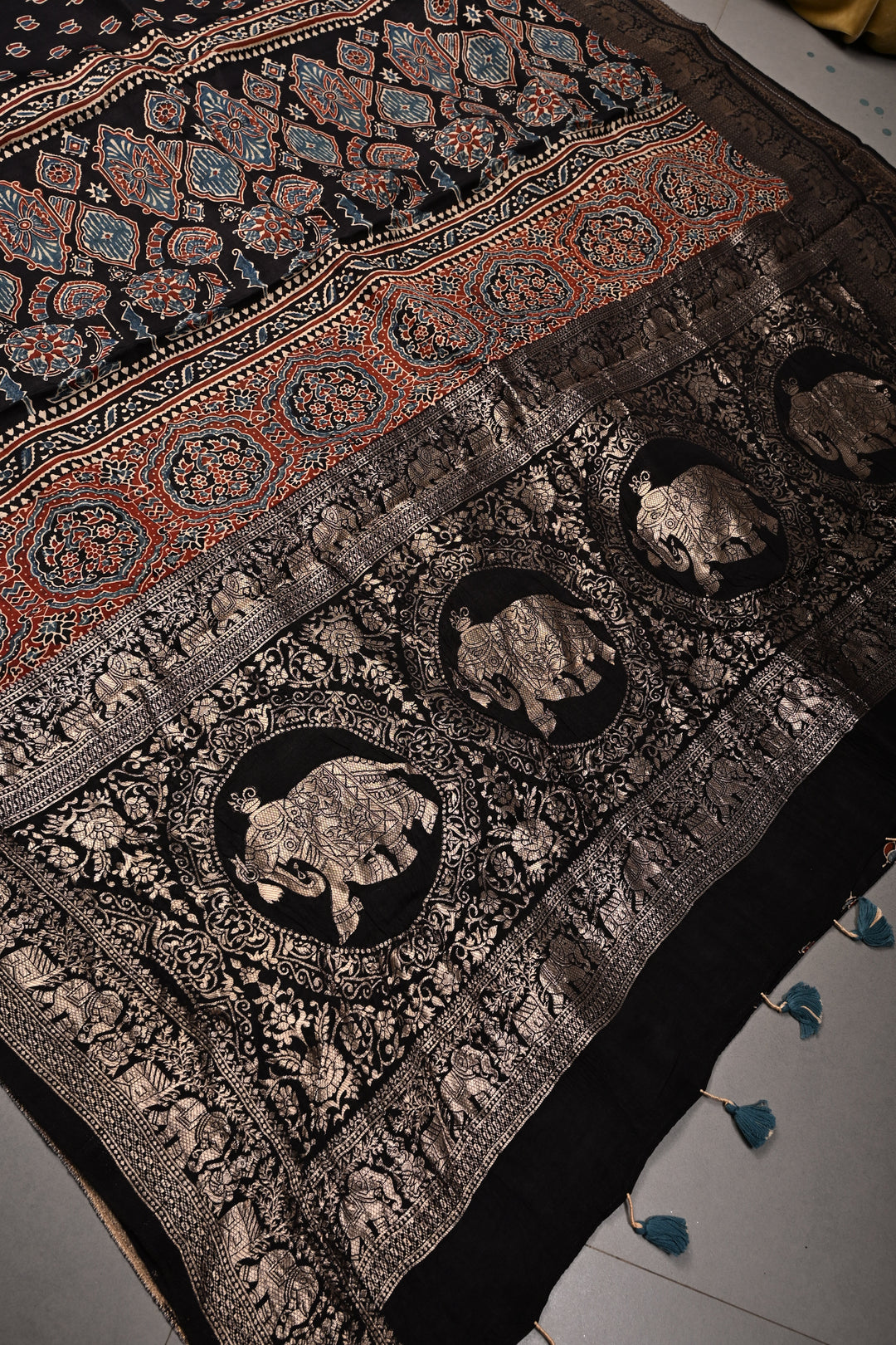 Black Ajrakh Hand Block Print on Dola Silk Saree with Fancy Zari Border | SHOBITAM