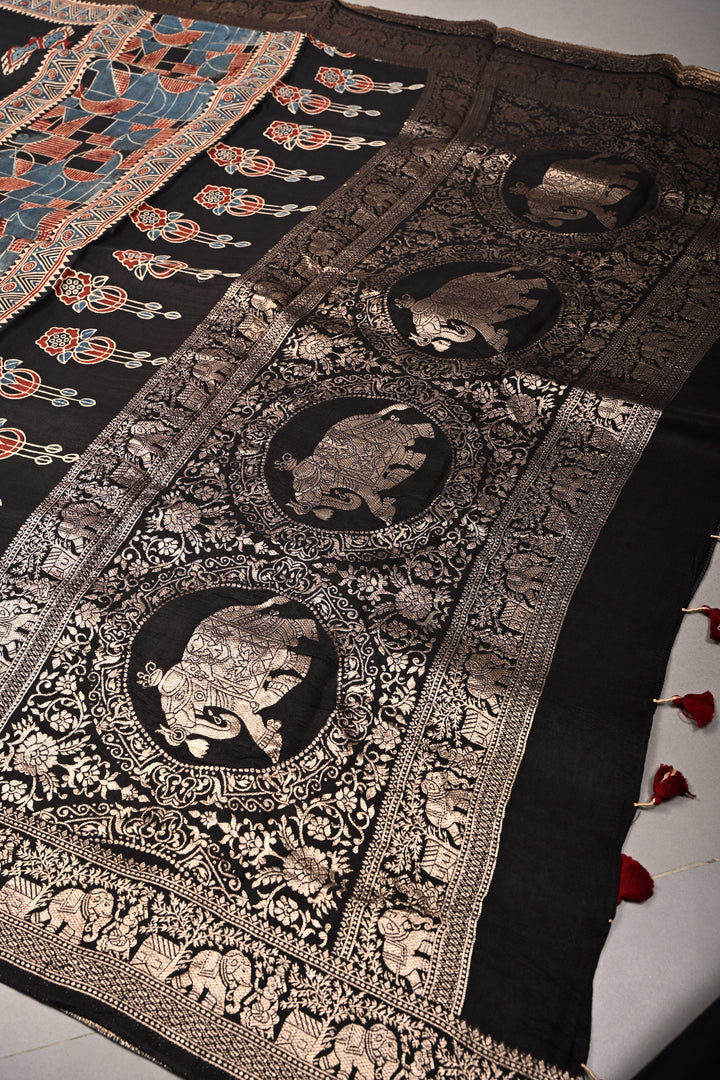 Black Ajrakh Hand Block Print on Dola Silk Saree with Fancy Zari Border | SHOBITAM