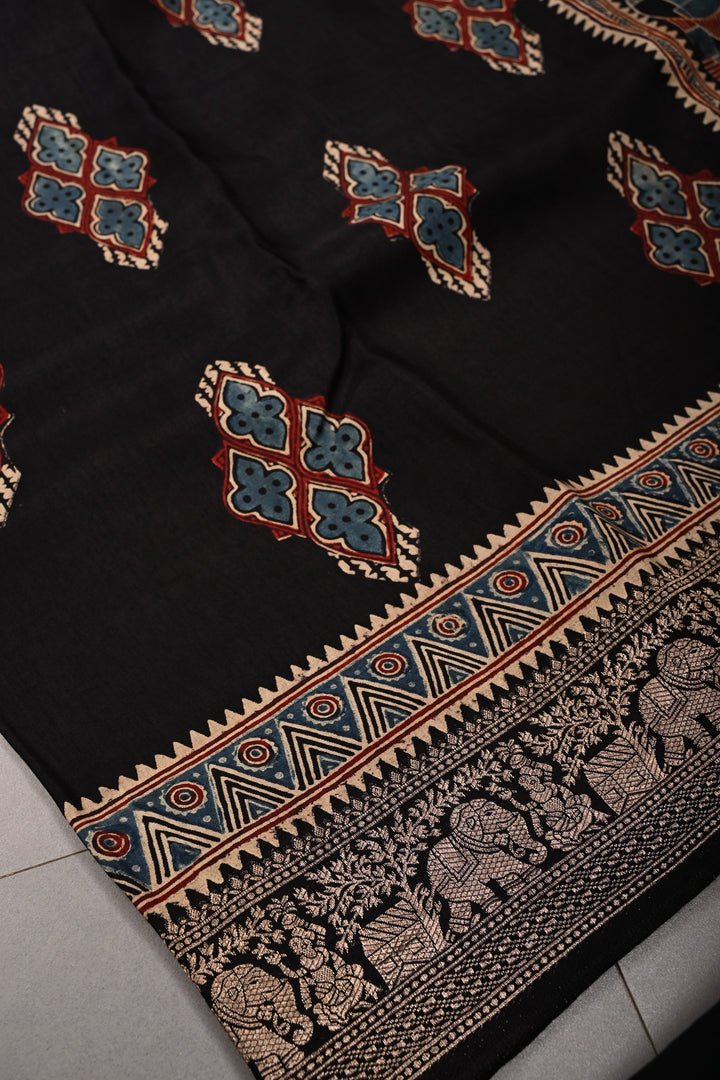 Black Ajrakh Hand Block Print on Dola Silk Saree with Fancy Zari Border | SHOBITAM
