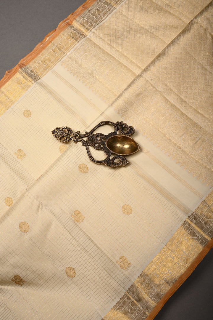 Off White Kanjivaram Zari Checks on Pure Silk Saree with Zari Buttas and Zari Border | SILK MARK CERTIFIED | SHOBITAM