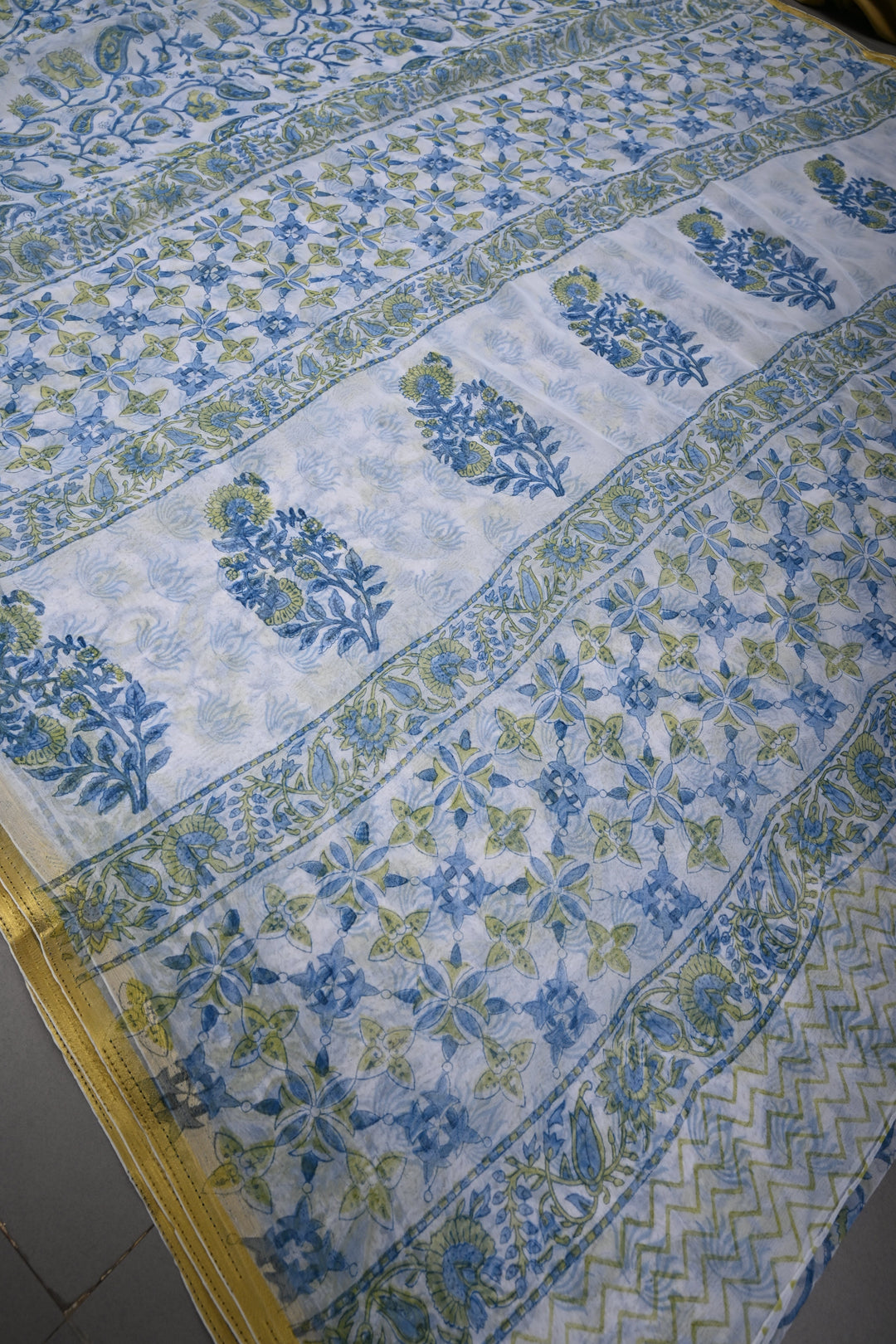 White Georgette Saree with Sanganeri Hand Block Print and Minimal Tissue Border | SHOBITAM