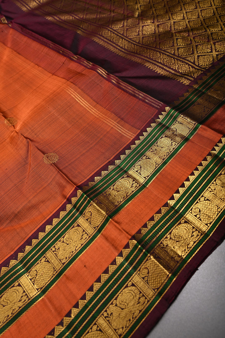 Rust Orange Kanjivaram Pure Silk Saree with Zari Buttas and Rettaipet Zari Border | SILK MARK CERTIFIED