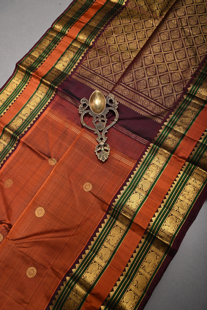 Rust Orange Kanjivaram Pure Silk Saree with Zari Buttas and Rettaipet Zari Border | SILK MARK CERTIFIED
