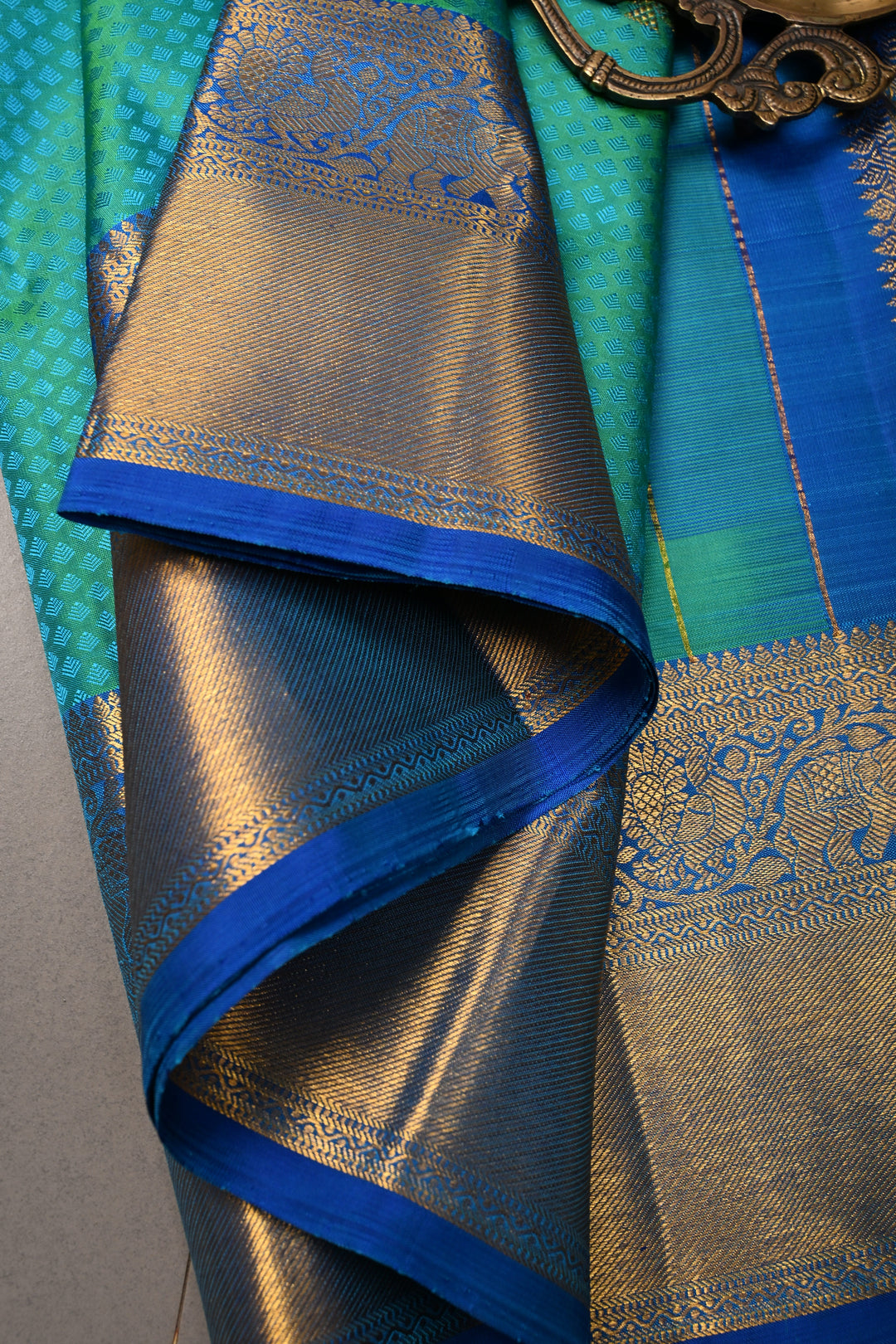 Blue-Green Dual Tone Self Brocade on Kanjivaram Pure Silk Saree with Damask Zari Buttas and Zari Border | SILK MARK CERTIFIED | SHOBITAM