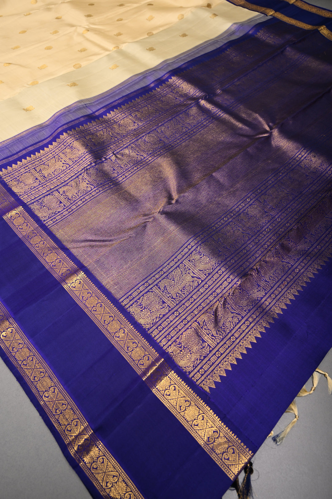 Cream Korvai Kanjivaram Pure Silk Saree with Zari Buttas and Contrast Zari Border | SILK MARK CERTIFIED | SHOBITAM