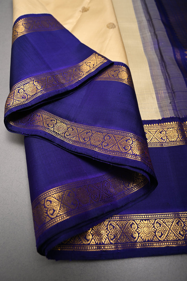 Cream Korvai Kanjivaram Pure Silk Saree with Zari Buttas and Contrast Zari Border | SILK MARK CERTIFIED | SHOBITAM