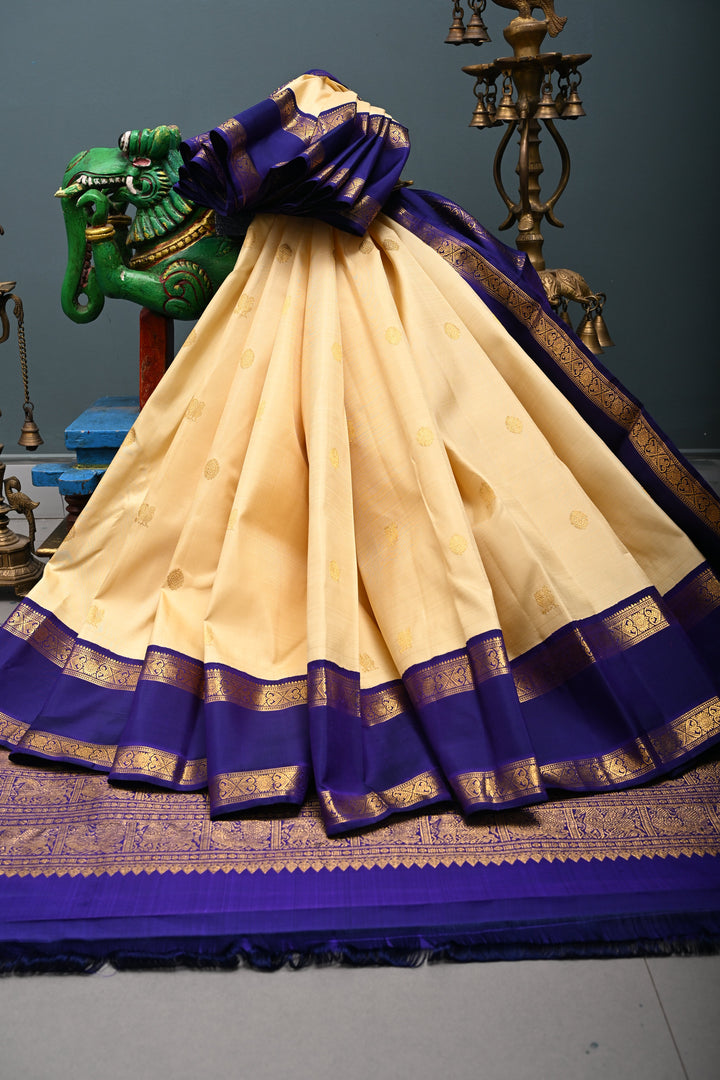 Cream Korvai Kanjivaram Pure Silk Saree with Zari Buttas and Contrast Zari Border | SILK MARK CERTIFIED | SHOBITAM
