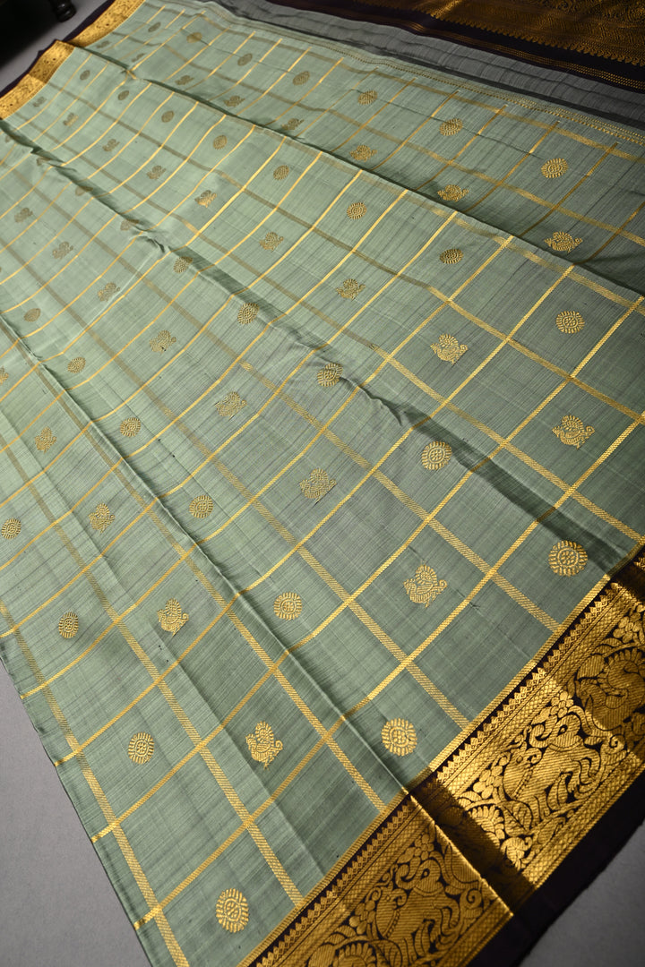 Sage Green Zari Checks on Kanjivaram Pure Silk Saree with Zari Buttas and Contrast Zari Border | SILK MARK CERTIFIED | SHOBITAM