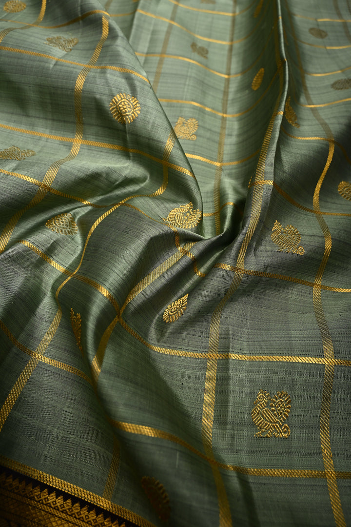 Sage Green Zari Checks on Kanjivaram Pure Silk Saree with Zari Buttas and Contrast Zari Border | SILK MARK CERTIFIED | SHOBITAM