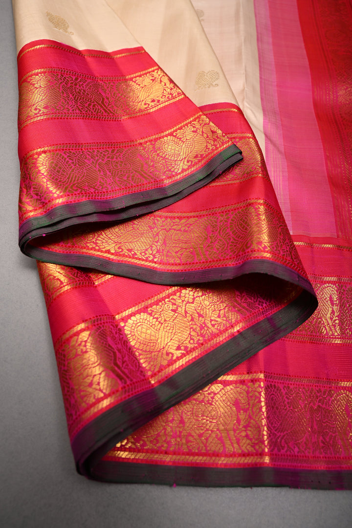 Cream Korvai Kanjivaram Pure Silk Saree with Zari Buttas and Contrast Zari Border | SILK MARK CERTIFIED | SHOBITAM
