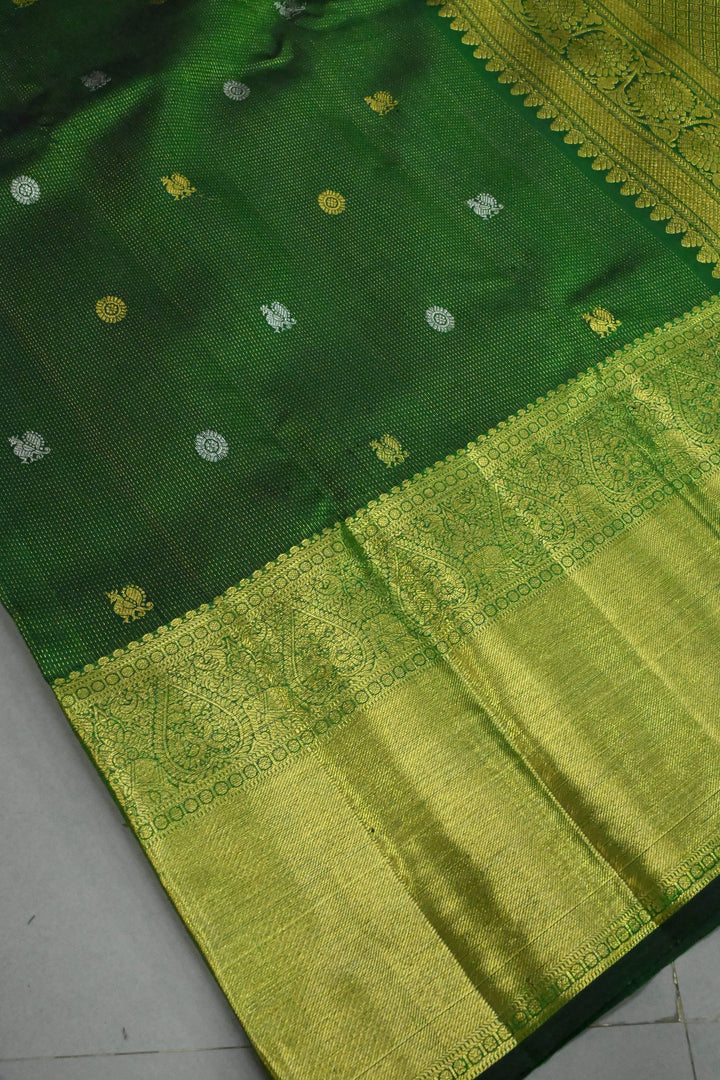 Deep Green Vairaoosi Zari Stripes on Pure Kanjivaram Silk Saree with Gold-Silver Zari Buttas and wide Zari Border | SILK MARK CERTIFIED | SHOBITAM