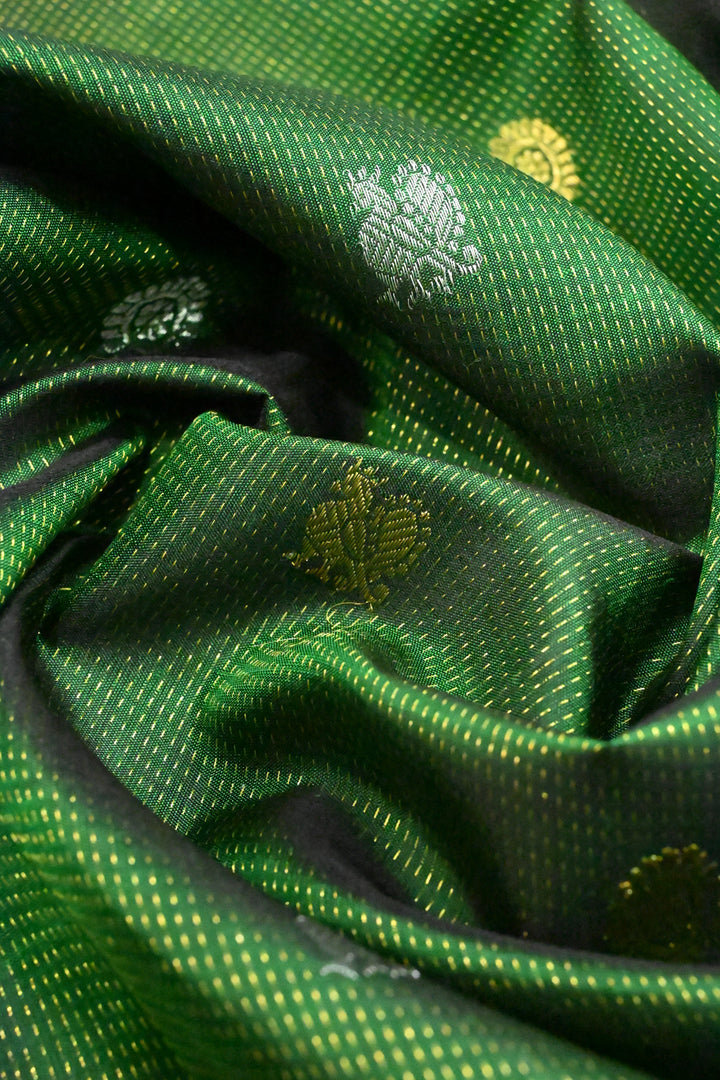 Deep Green Vairaoosi Zari Stripes on Pure Kanjivaram Silk Saree with Gold-Silver Zari Buttas and wide Zari Border | SILK MARK CERTIFIED | SHOBITAM