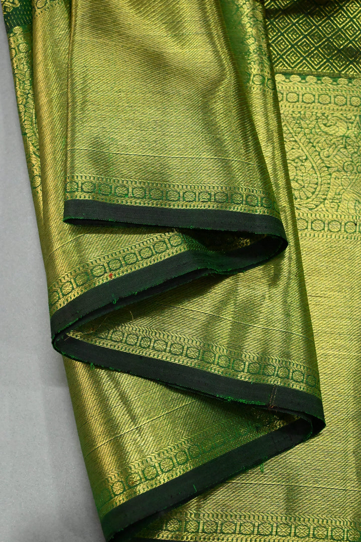 Deep Green Vairaoosi Zari Stripes on Pure Kanjivaram Silk Saree with Gold-Silver Zari Buttas and wide Zari Border | SILK MARK CERTIFIED | SHOBITAM