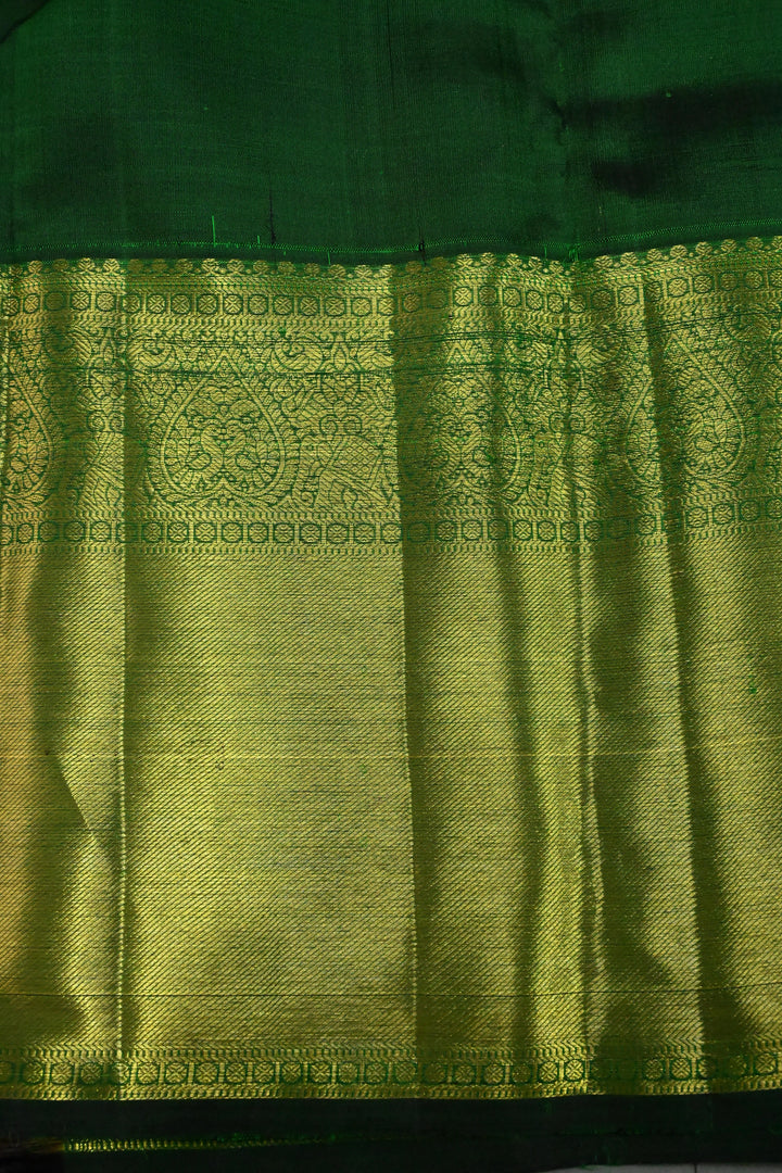 Deep Green Vairaoosi Zari Stripes on Pure Kanjivaram Silk Saree with Gold-Silver Zari Buttas and wide Zari Border | SILK MARK CERTIFIED | SHOBITAM