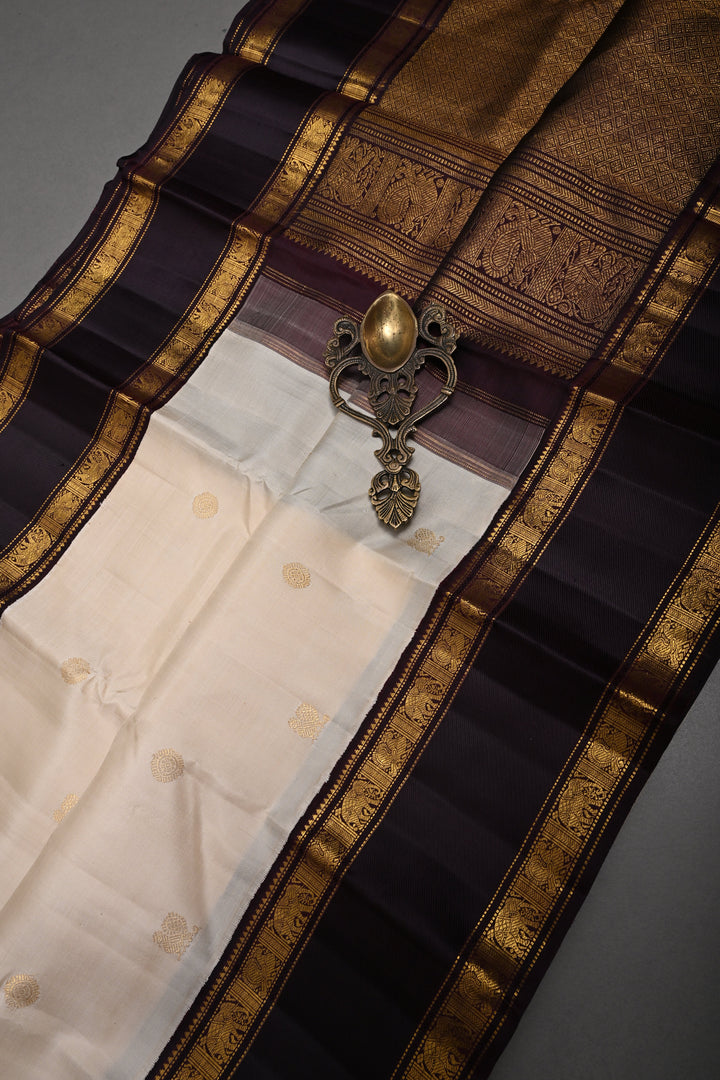 Cream Korvai Kanjivaram Pure Silk Saree with Zari Buttas and Contrast Zari Border | SILK MARK CERTIFIED | SHOBITAM