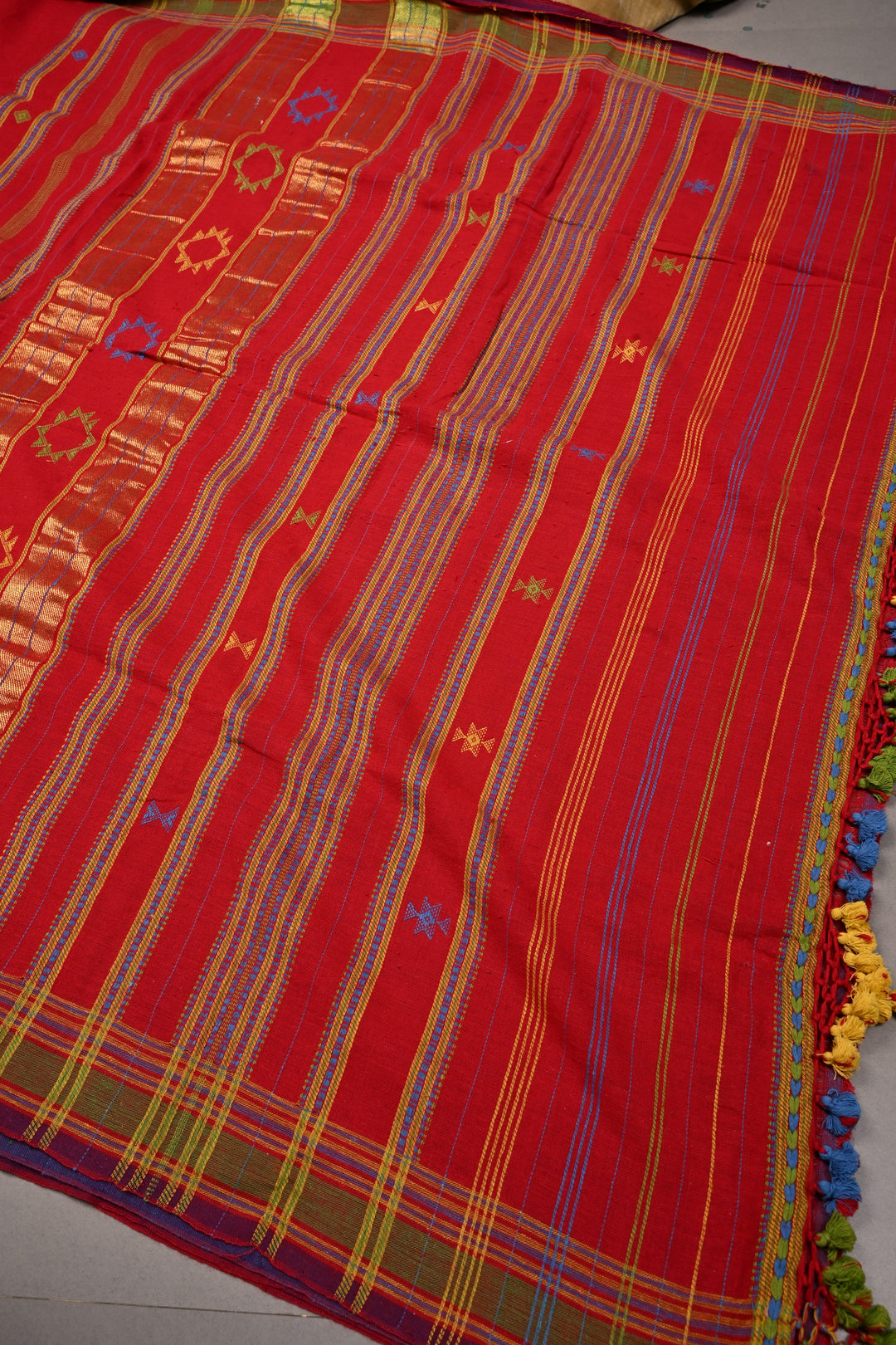 Blood Red Bhujodi Kala Cotton Saree with Meenakari Buttas and Honeycomb Tassels | SHOBITAM