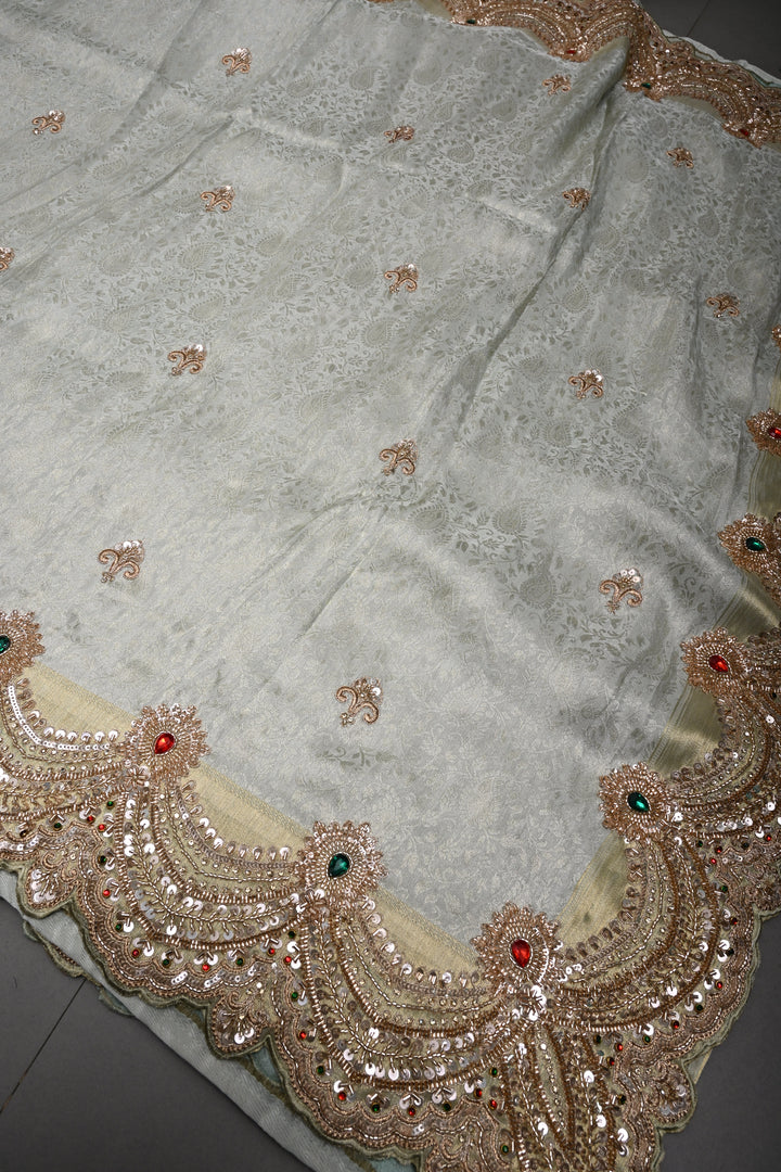 Light Sage Green Tissue Viscose Brocade Saree with Zardosi Buttas and Heavy Embroidery Work on Scallop Border | SHOBITAM