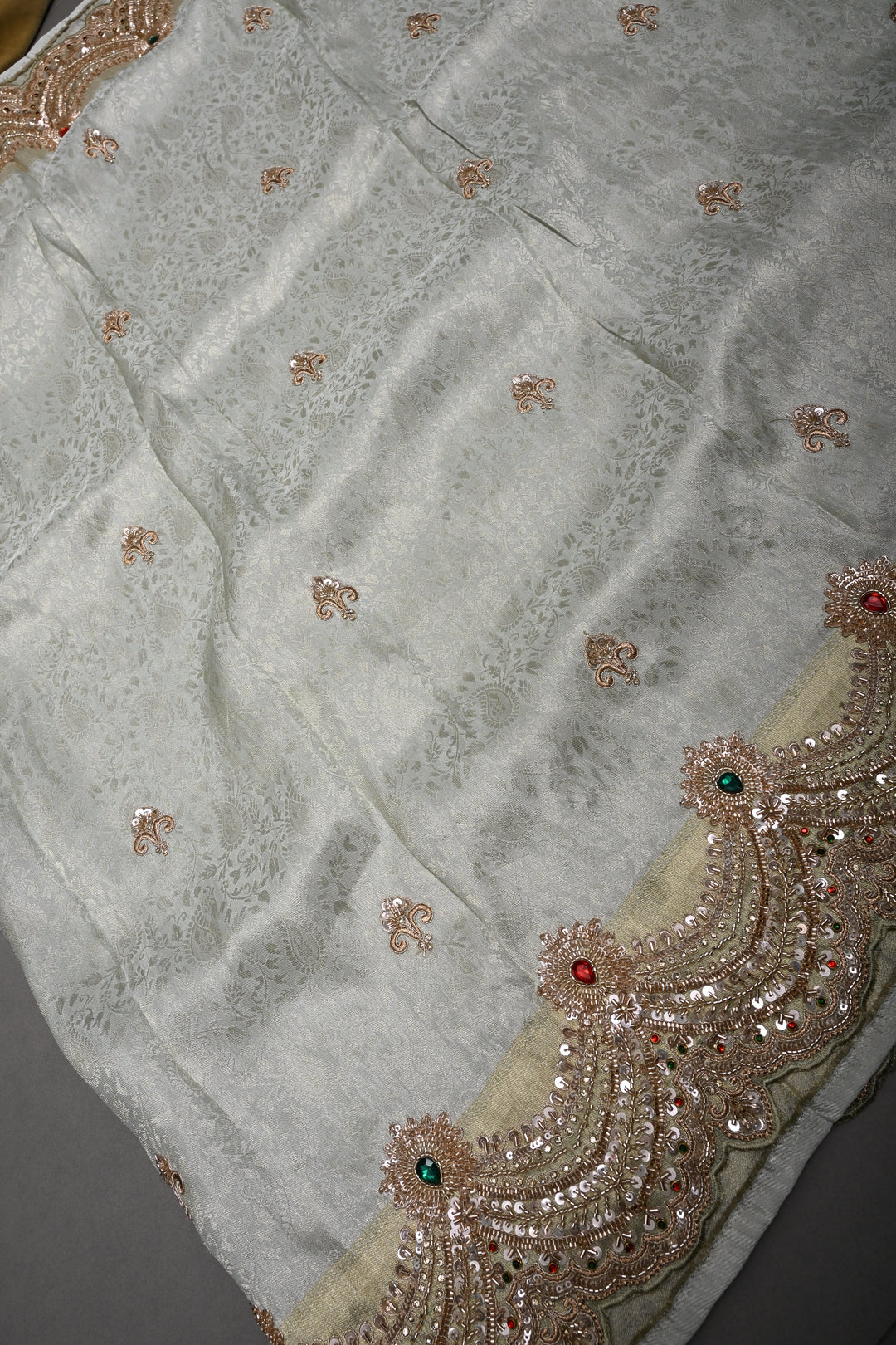 Light Sage Green Tissue Viscose Brocade Saree with Zardosi Buttas and Heavy Embroidery Work on Scallop Border | SHOBITAM