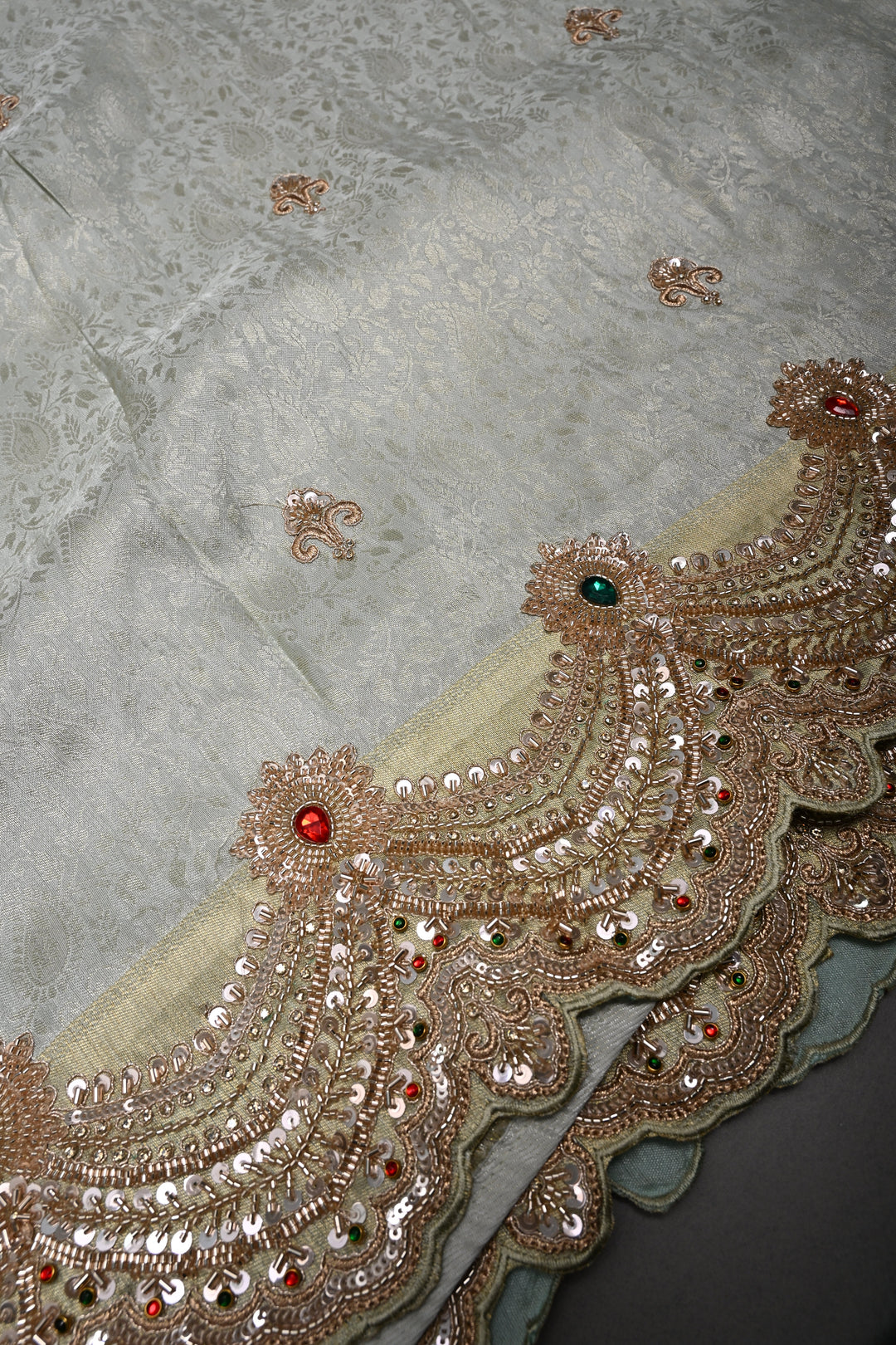 Light Sage Green Tissue Viscose Brocade Saree with Zardosi Buttas and Heavy Embroidery Work on Scallop Border | SHOBITAM