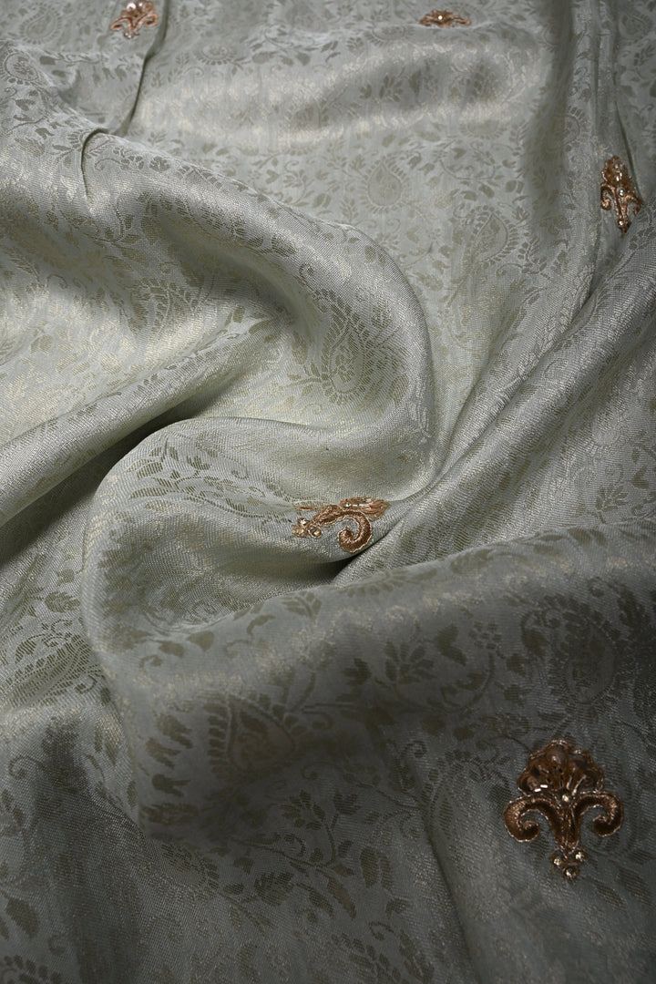 Light Sage Green Tissue Viscose Brocade Saree with Zardosi Buttas and Heavy Embroidery Work on Scallop Border | SHOBITAM