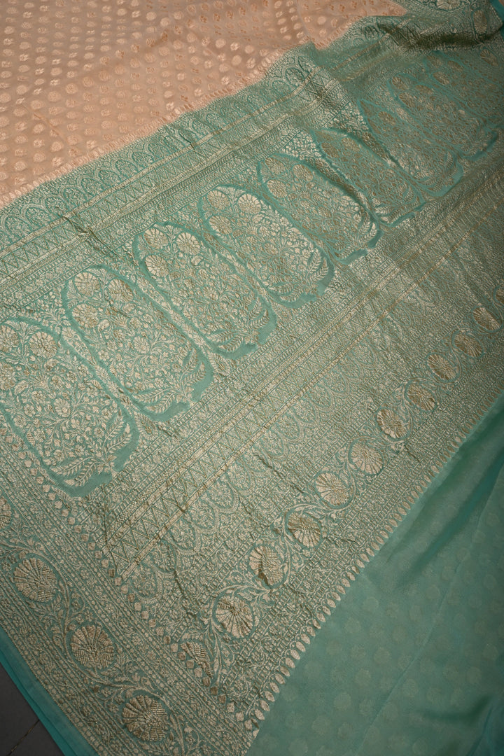 Muted Ivory Banarasi Silk Georgette Saree with Zari Brocade and Teal Contrast Zari Border | SILK MARK CERTIFIED | SHOBITAM