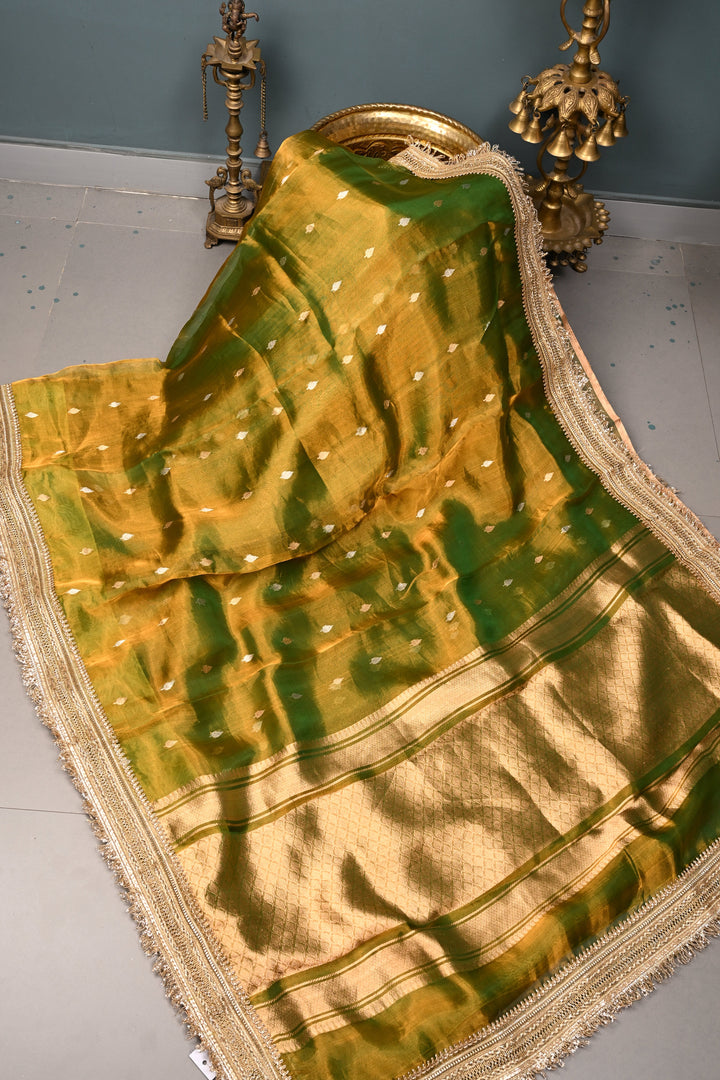Mehendi Green Dual Tone Pure Banarasi Organza Tissue Silk Saree with Sona Rupa Floral Zari Buttas and Fancy Trim Lace Border | SILK MARK CERTIFIED | SHOBITAM