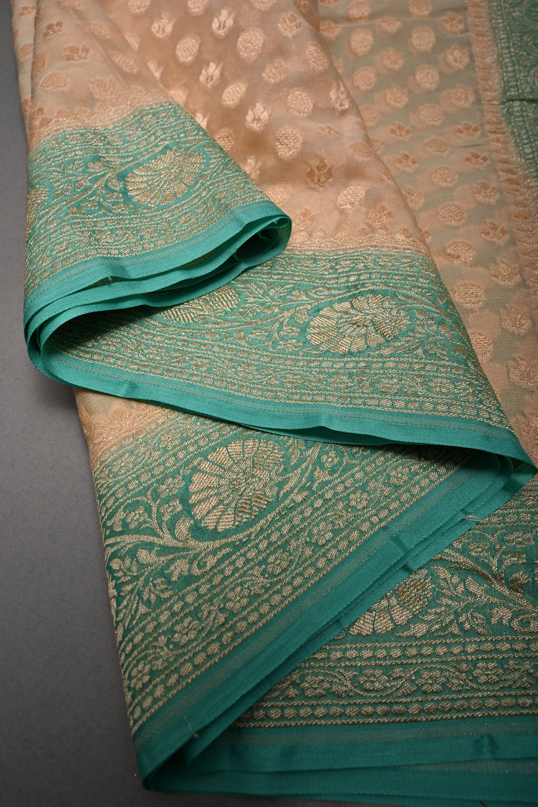 Muted Ivory Banarasi Silk Georgette Saree with Zari Brocade and Teal Contrast Zari Border | SILK MARK CERTIFIED | SHOBITAM