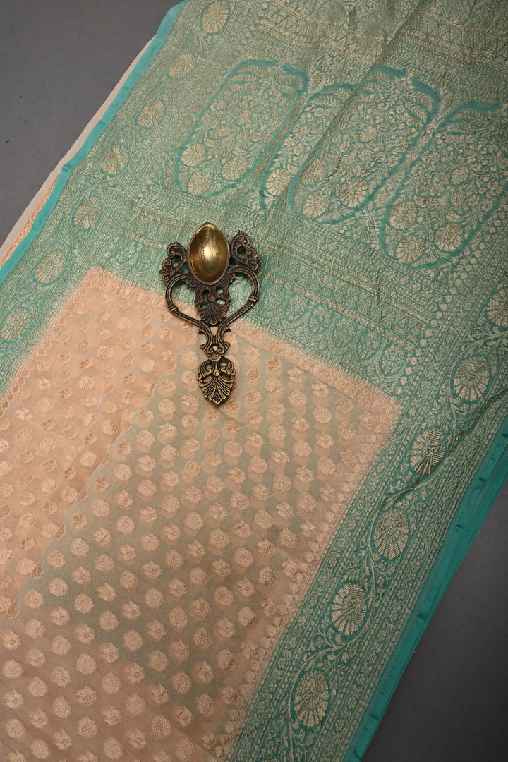 Muted Ivory Banarasi Silk Georgette Saree with Zari Brocade and Teal Contrast Zari Border | SILK MARK CERTIFIED | SHOBITAM