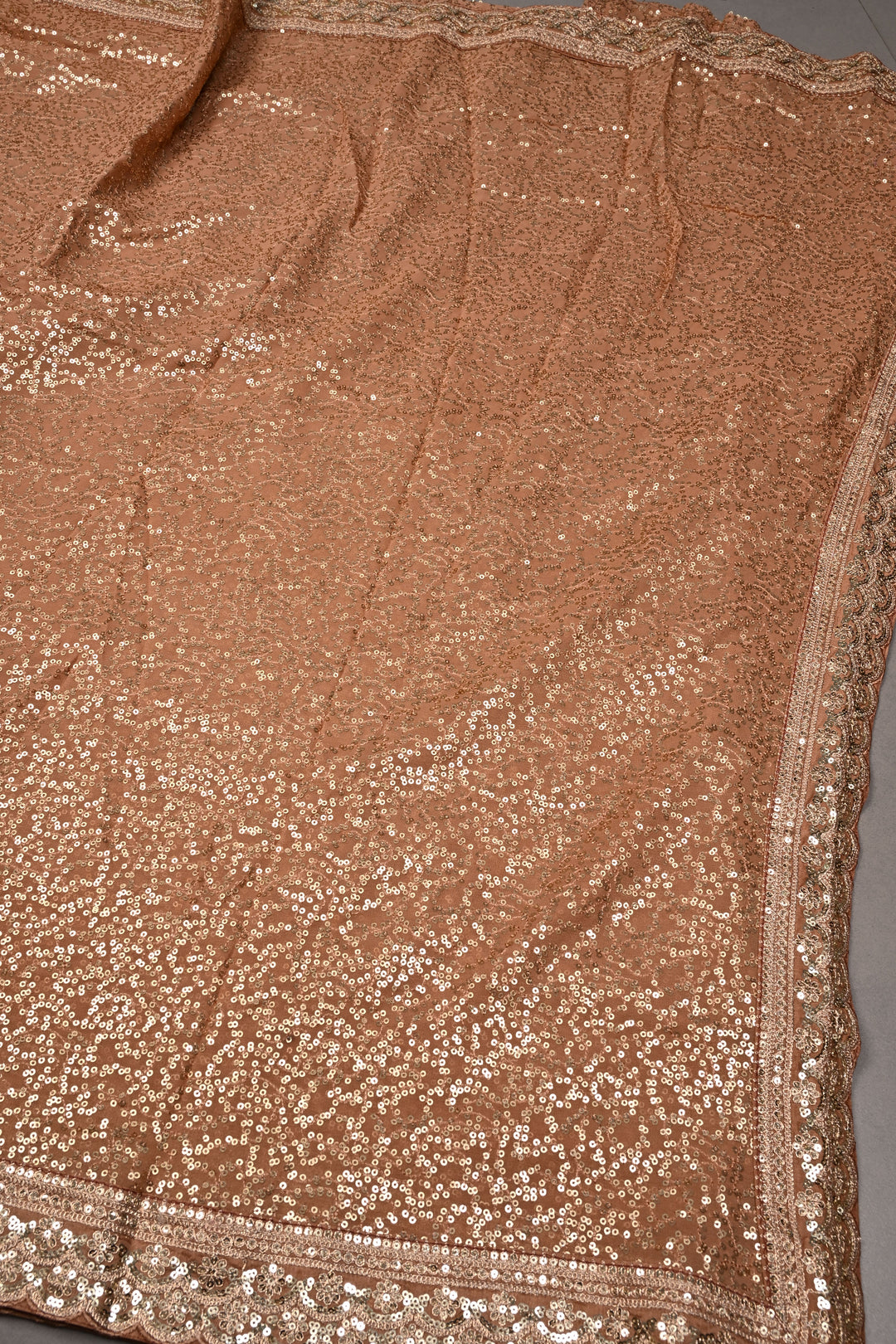 Full Sequins Embellished on Georgette Saree in Pinkish Brown with Scalloped Border |SHOBITAM