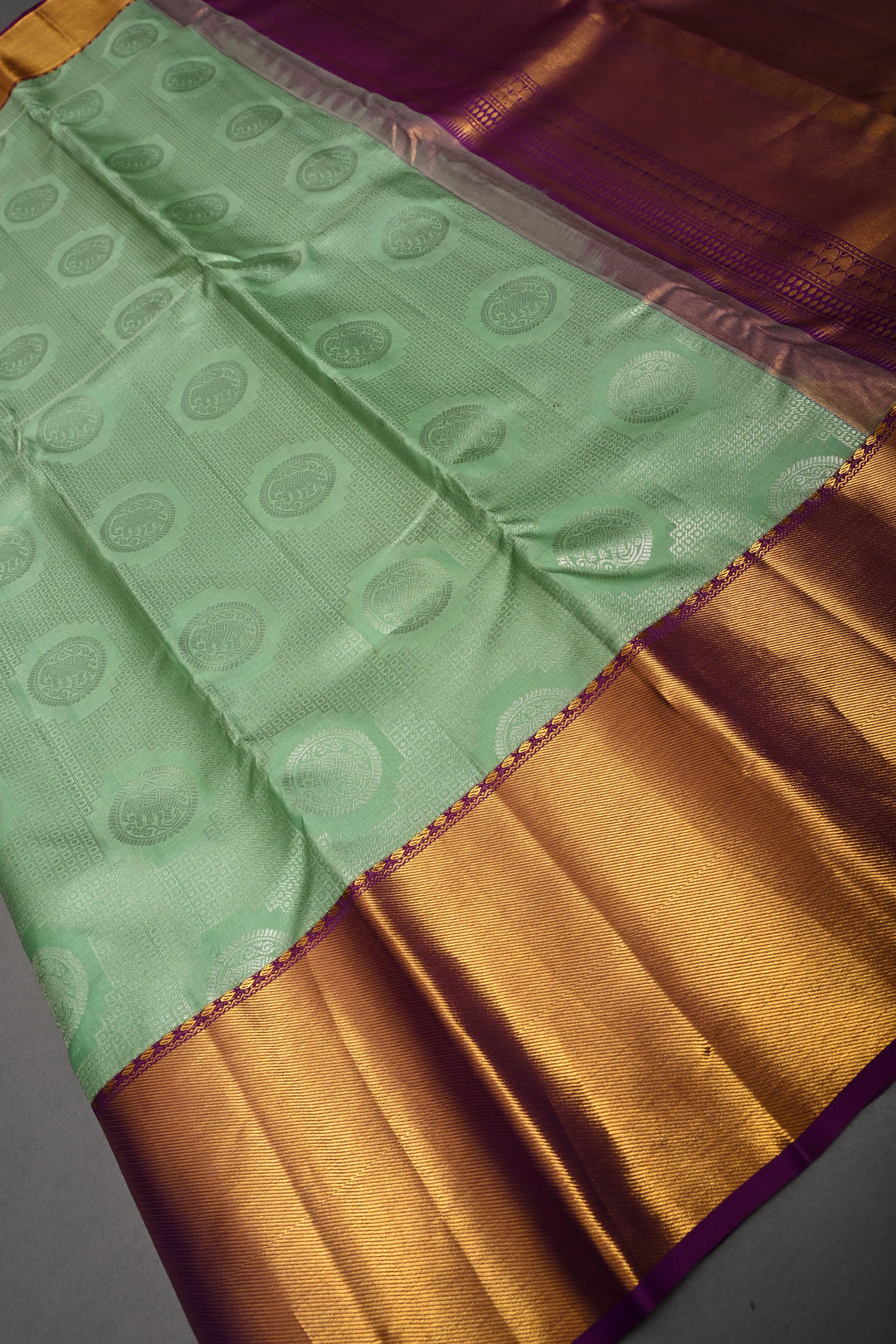 Mint Green Pure Kanjivaram Silk Saree with Silver Mandala Elephant Brocade and Contrast Zari Border | SILK MARK CERTIFIED | SHOBITAM