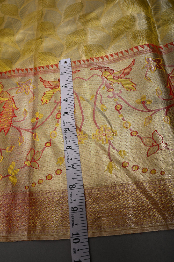 Elegant Butter Yellow Gold Pure Kanjivaram Tissue Silk Saree with Leaf Brocade and Meenakari Red Contrast Zari Border | SILK MARK CERTIFIED | SHOBITAM