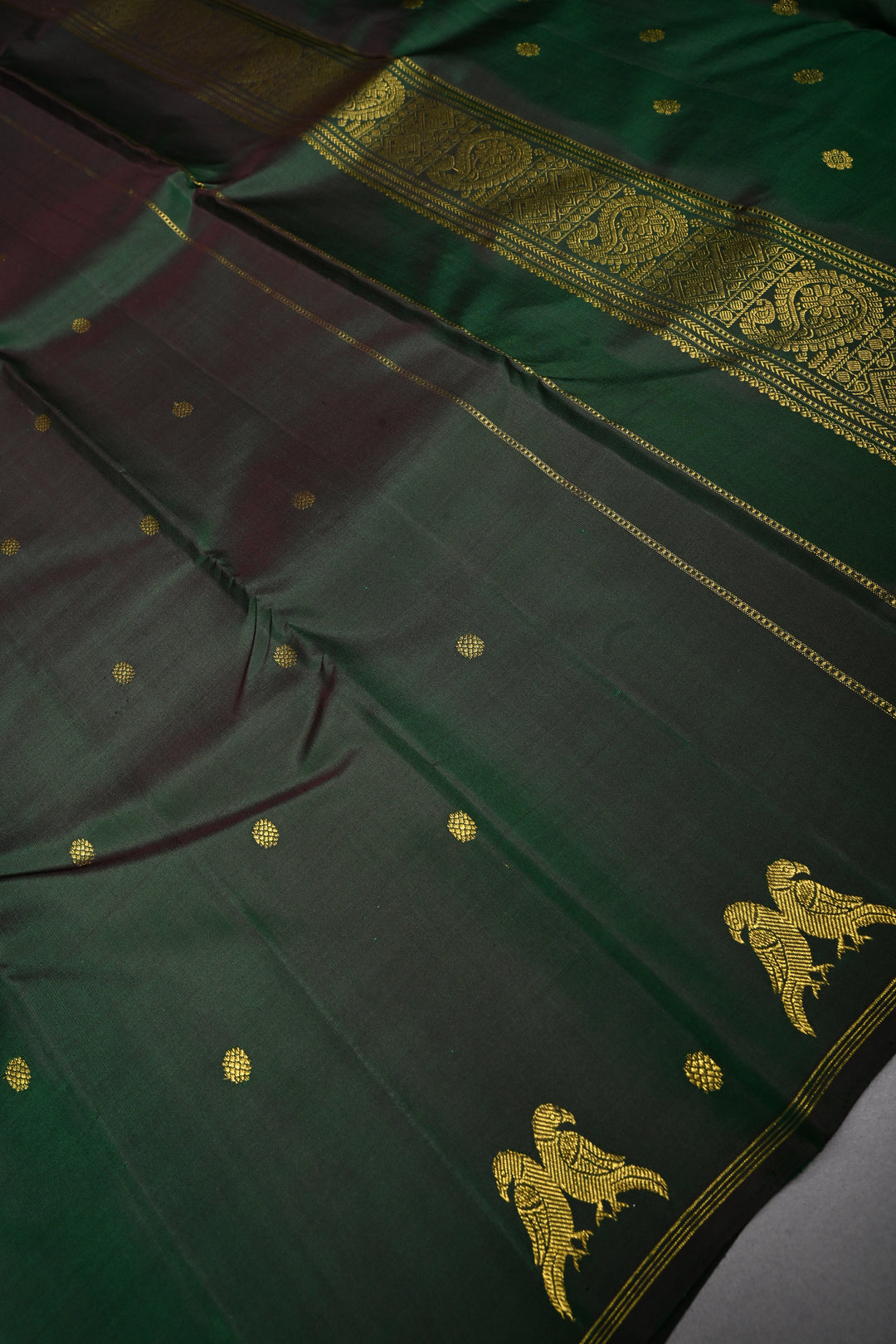 Deep Green Kanjivaram Pure Silk Saree with Zari Buttis and Distinct Twin Parrot Motifs on Border | SILK MARK CERTIFIED | SHOBITAM