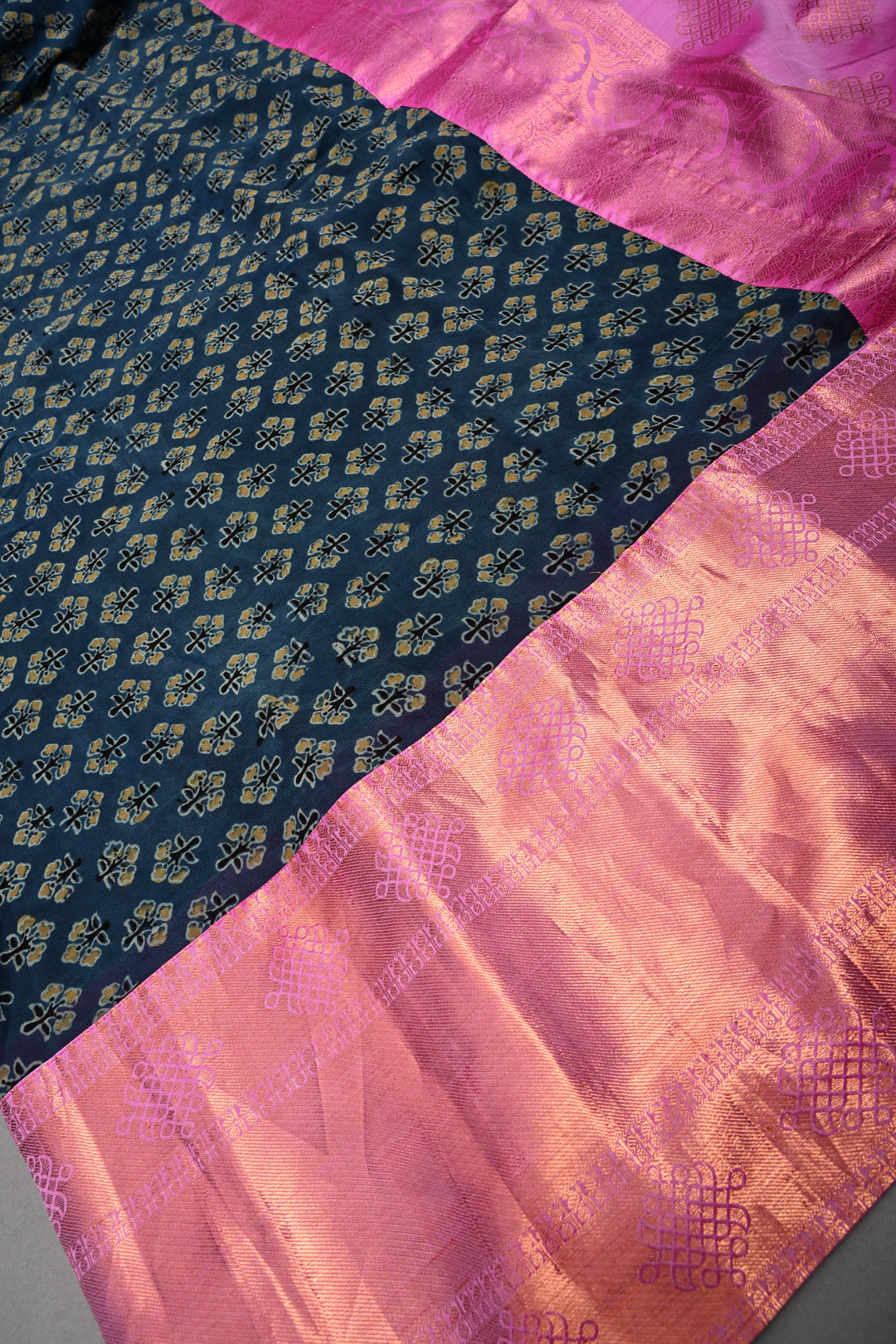 Exquisite Peacock Blue Georgette Ajrakh Hand Block Print Fusion Saree with Contrast Pure Silk Kanjivaram Rangoli Zari Border and Pallu | SHOBITAM