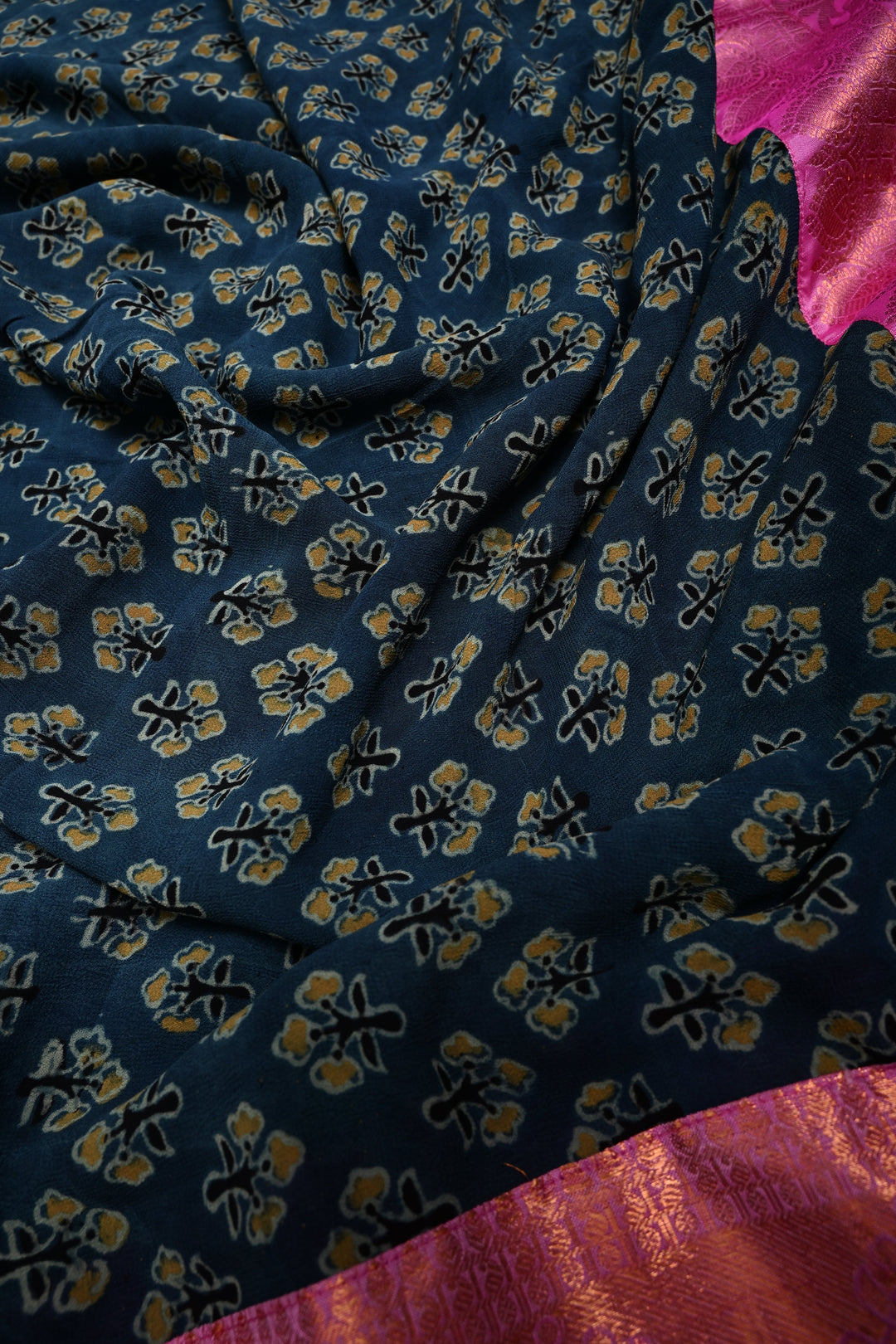 Exquisite Peacock Blue Georgette Ajrakh Hand Block Print Fusion Saree with Contrast Pure Silk Kanjivaram Rangoli Zari Border and Pallu | SHOBITAM