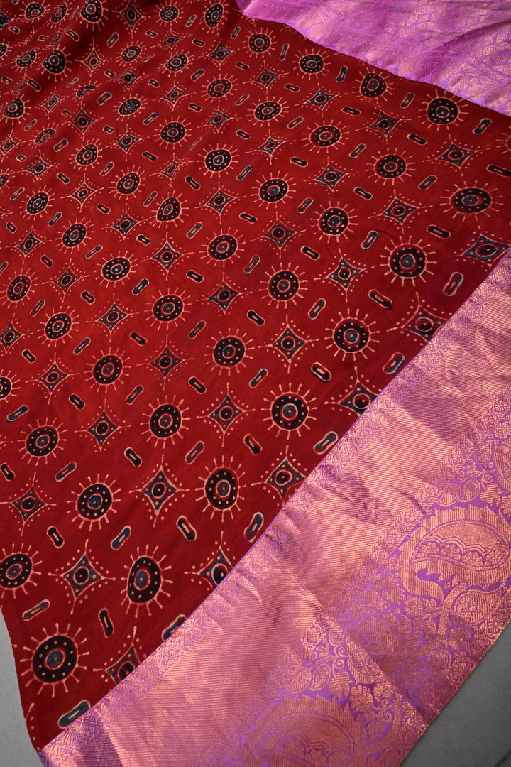 Brick Red Georgette Ajrakh Hand Block Print Fusion Saree with Contrast Pure Silk Kanchi Border and Pallu | SHOBITAM