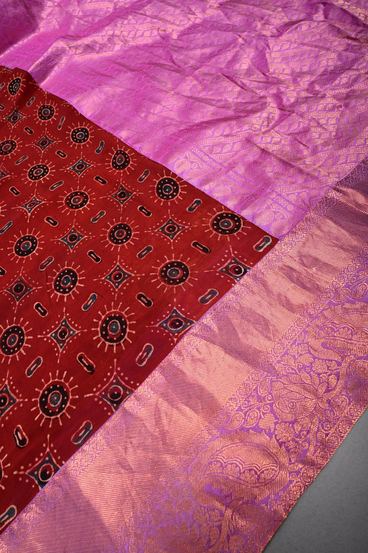 Brick Red Georgette Ajrakh Hand Block Print Fusion Saree with Contrast Pure Silk Kanchi Border and Pallu | SHOBITAM