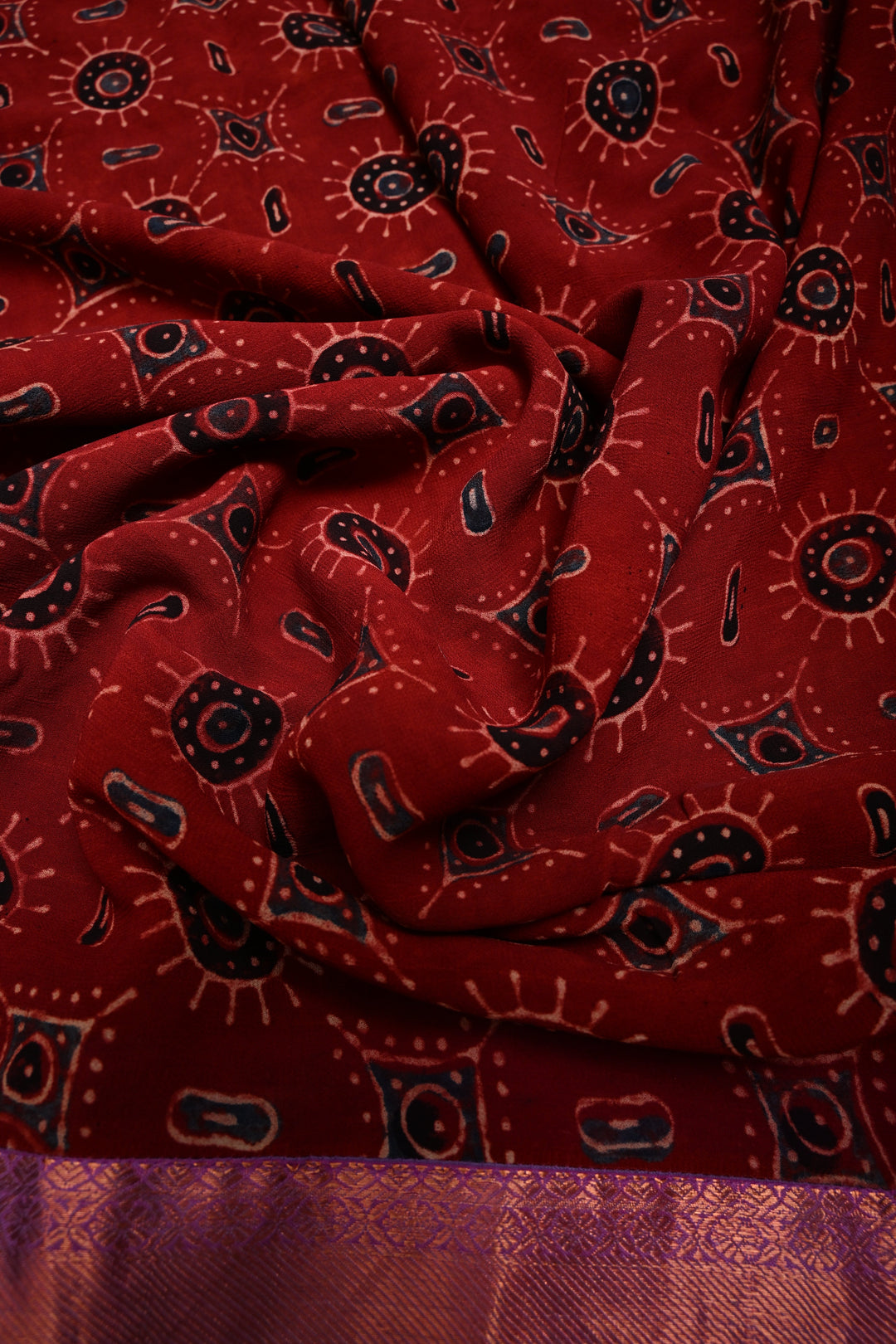 Brick Red Georgette Ajrakh Hand Block Print Fusion Saree with Contrast Pure Silk Kanchi Border and Pallu | SHOBITAM