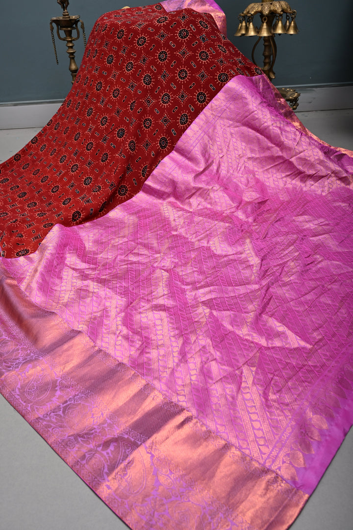 Brick Red Georgette Ajrakh Hand Block Print Fusion Saree with Contrast Pure Silk Kanchi Border and Pallu | SHOBITAM