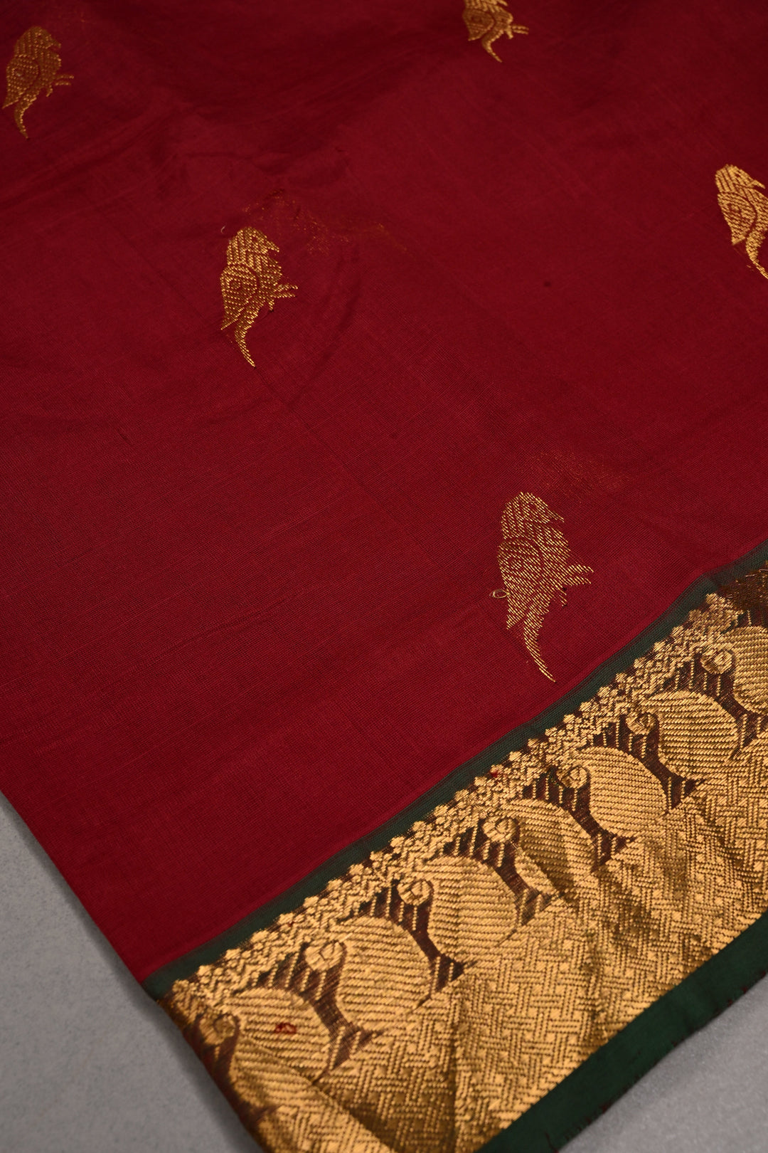 Burgundy Kanchi Silk Cotton 100% Handloom Saree with Parrot Zari Buttas and Contrast Zari Border | SHOBITAM